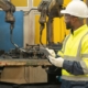 welding operator reviewing equipment
