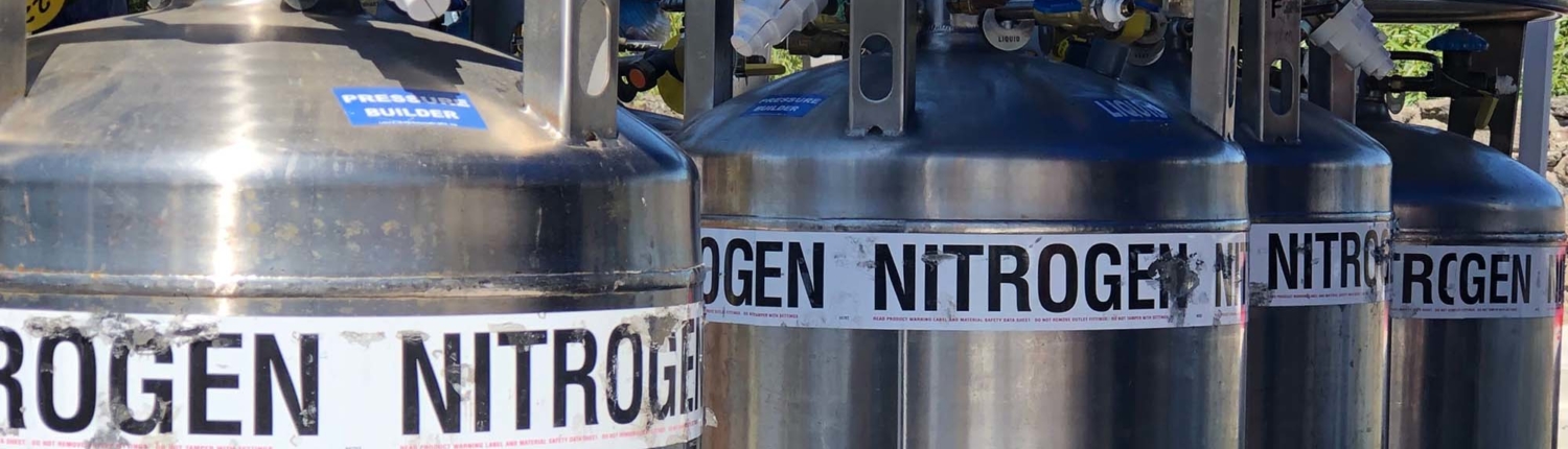 a row of four nitrogen tanks